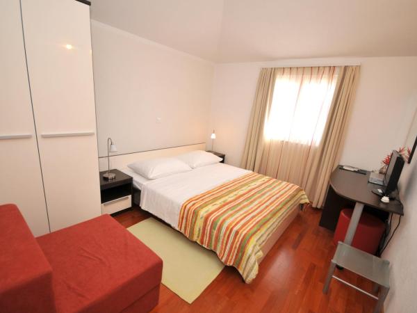 Apartments & Rooms Villa Maslina : photo 7 de la chambre chambre double