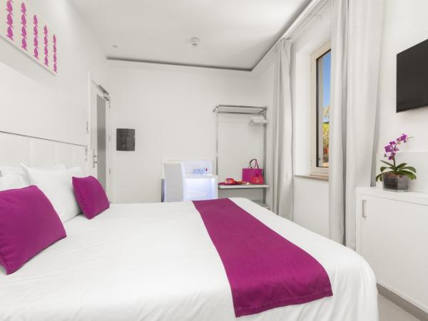 Hotel Tasso Suites & Spa : photo 1 de la chambre chambre double ou lits jumeaux standard
