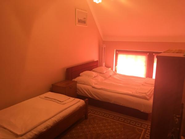 Nora Ház Hajdúszoboszló : photo 7 de la chambre chambre triple basique