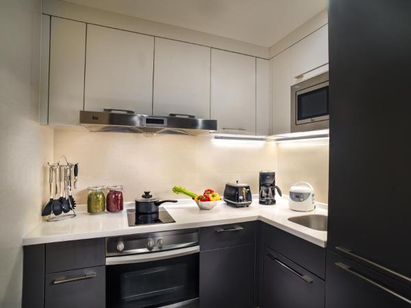 Oakwood Premier Guangzhou-Free Shuttle Bus to Canton Fair Complex : photo 4 de la chambre studio supérieur