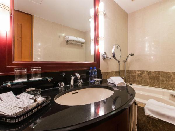 Ruishi Hotel Dalian : photo 5 de la chambre chambre double ou lits jumeaux exécutive