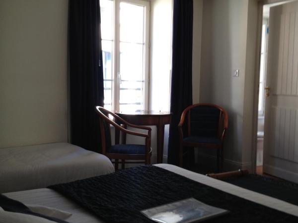 Le Querrien : photo 3 de la chambre chambre tradition - 3 personnes