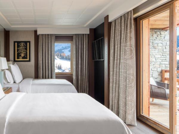 Four Seasons Hotel Megeve : photo 2 de la chambre chambre de luxe avec 2 lits jumeaux