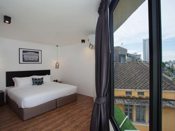 Oriental Heritage Residence : photo 5 de la chambre suite deluxe avec lit king-size