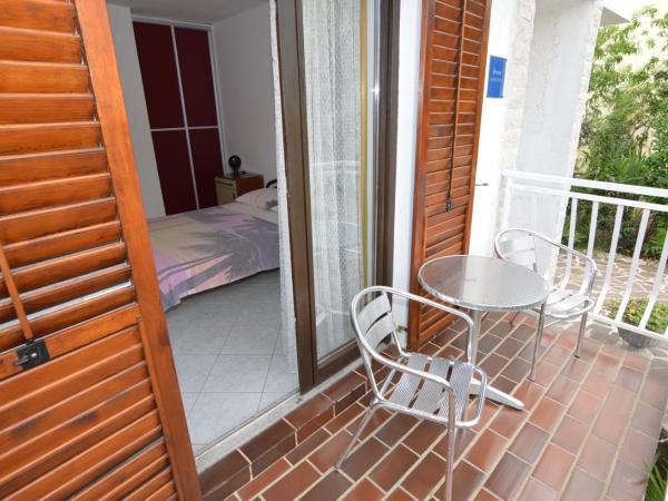 Arthouse Villa Palma : photo 8 de la chambre appartement - vue sur jardin
