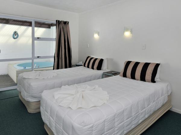 Palm Court Motor Inn : photo 5 de la chambre appartement 1 chambre avec jacuzzi