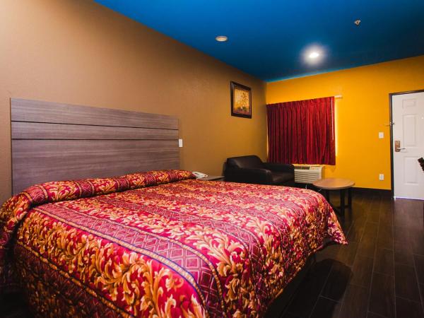 Moonlight Suites - Houston/George Bush Int'l Airport : photo 8 de la chambre chambre lit king-size