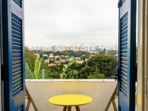Paradiso Hostel & Suites - TOP 1 DE SÃO PAULO : photo 3 de la chambre chambre triple avec terrasse et salle de bains commune