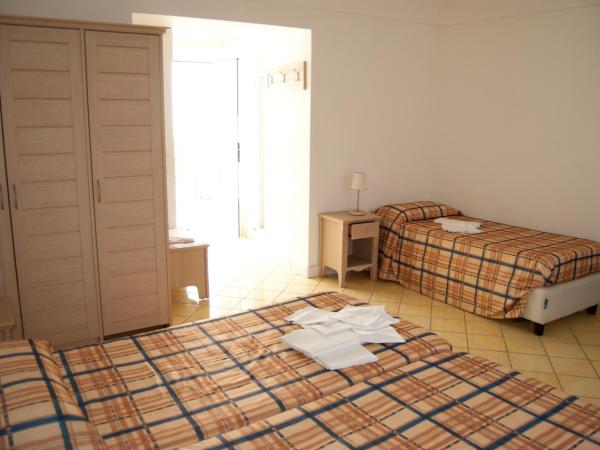 Albergo Villa Giusto : photo 5 de la chambre chambre familiale