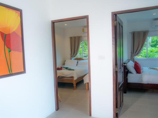 White Flower Lanta : photo 9 de la chambre chambre quadruple - vue sur mer