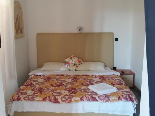 Rooms Laura : photo 1 de la chambre chambre quadruple