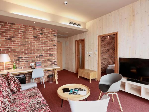 Absolutum Wellness Hotel : photo 1 de la chambre suite deluxe avec balcon