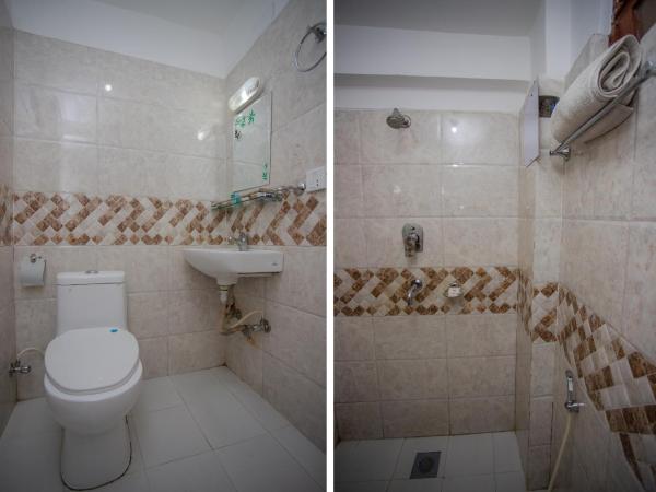 Traveler's Holiday Inn : photo 1 de la chambre deluxe