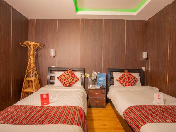 Traveler's Holiday Inn : photo 6 de la chambre chambre double ou lits jumeaux standard