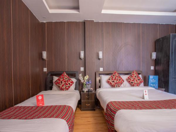 Traveler's Holiday Inn : photo 10 de la chambre deluxe