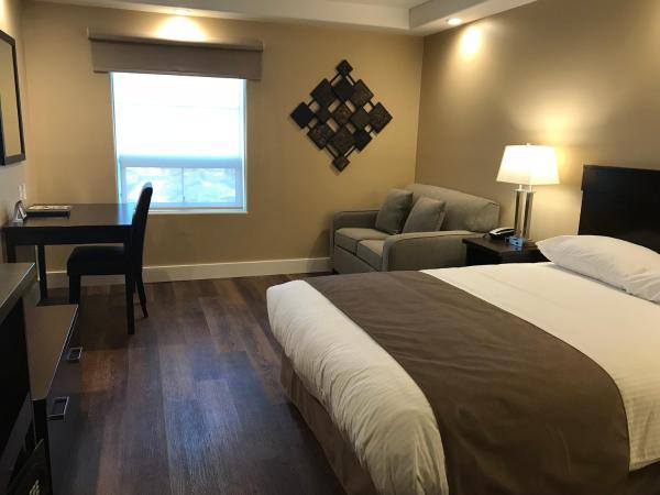 Chateau Louis Hotel & Conference Centre : photo 1 de la chambre chambre lit king-size deluxe