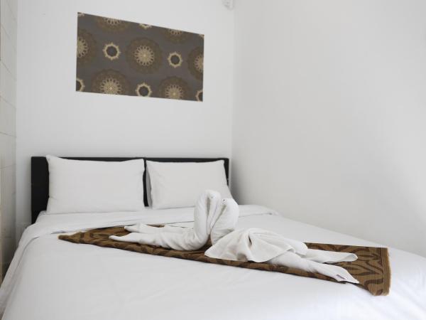Mawar Villa, Batu Hitam : photo 4 de la chambre suite familiale