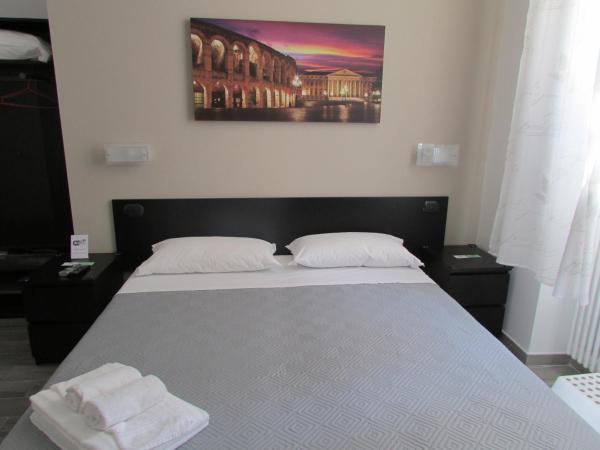 Affittacamere Verona in : photo 3 de la chambre chambre double ou lits jumeaux - accessible aux personnes à mobilité réduite