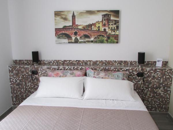 Affittacamere Verona in : photo 5 de la chambre chambre lit king-size