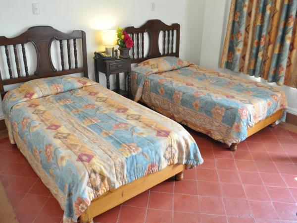 Hotel 5a Avenida : photo 2 de la chambre chambre lits jumeaux