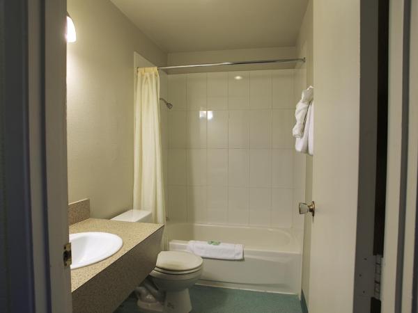 Aladdin Inn and Suites : photo 2 de la chambre chambre lit queen-size
