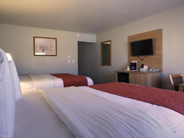 Aladdin Inn and Suites : photo 5 de la chambre chambre avec 2 grands lits queen-size