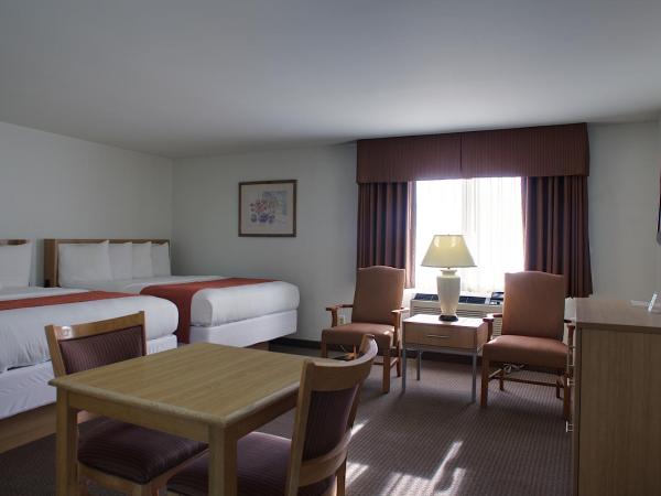 Aladdin Inn and Suites : photo 1 de la chambre chambre avec 2 grands lits queen-size