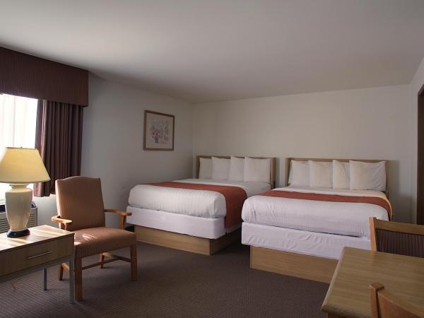 Aladdin Inn and Suites : photo 2 de la chambre chambre avec 2 grands lits queen-size