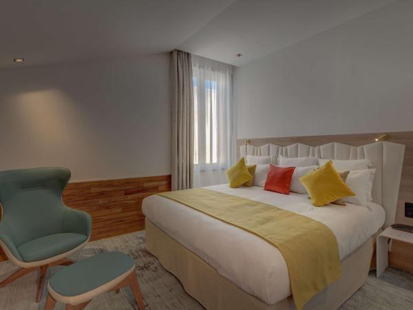 Best Western Plus Comedie Saint Roch : photo 1 de la chambre suite lit king-size avec baignoire