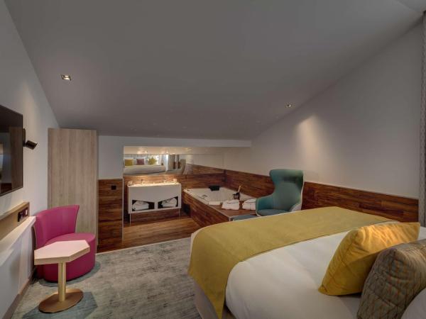 Best Western Plus Comedie Saint Roch : photo 3 de la chambre suite lit king-size avec baignoire