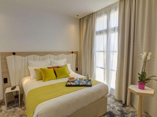 Best Western Plus Comedie Saint Roch : photo 1 de la chambre chambre lit queen-size prestige