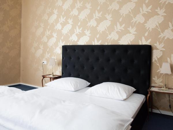 Matejki 8 : photo 2 de la chambre suite deluxe avec lit king-size