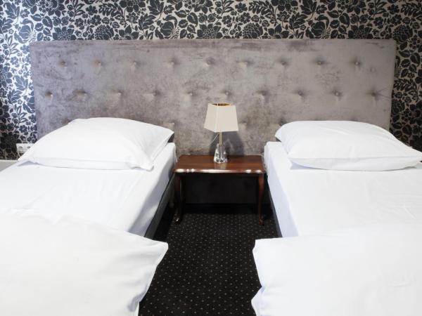 Matejki 8 : photo 4 de la chambre chambre double avec 2 lits simples