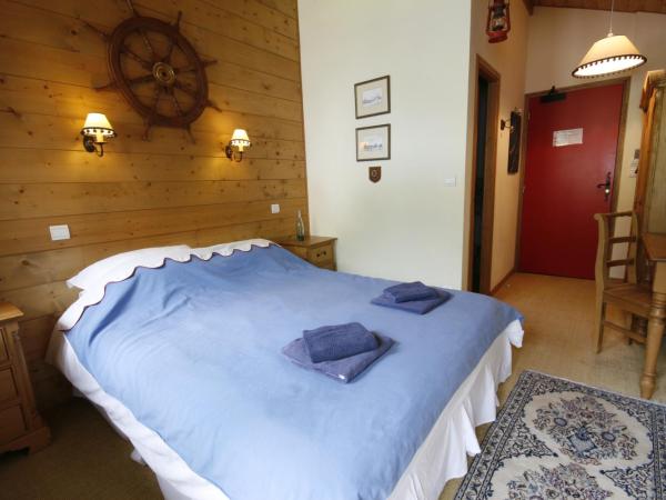 Hôtel et Chalet Au Coin Du Feu Chilly Powder : photo 2 de la chambre chambre double ou lits jumeaux