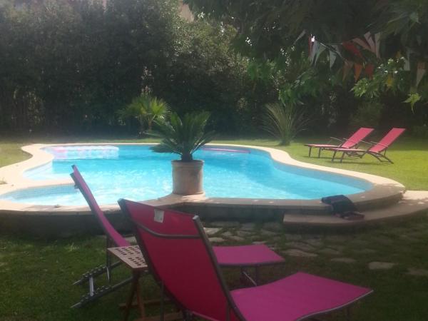 Sous le mûrier : photo 9 de la chambre chambre quadruple avec salle de bains privative séparée