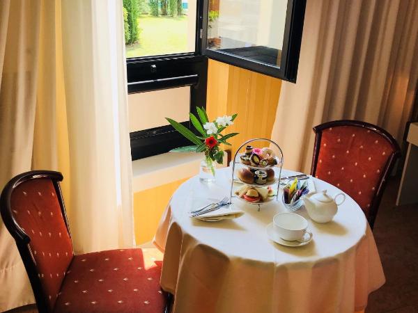 Hotel Maxim : photo 4 de la chambre chambre double ou lits jumeaux