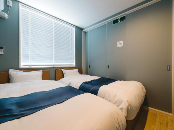 Trip Base HAKATAEKIMAE : photo 10 de la chambre suite familiale