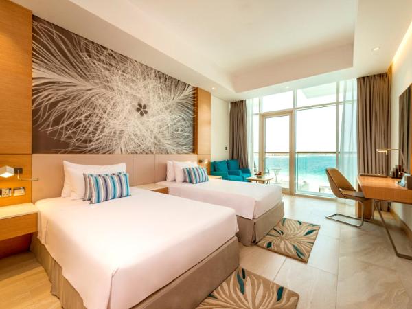 Royal Central Hotel and Resort The Palm : photo 2 de la chambre hébergement familial - 2 chambres communicantes