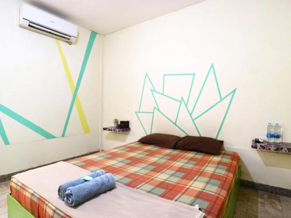 Wisma Gading Indah 1 : photo 4 de la chambre chambre double supérieure