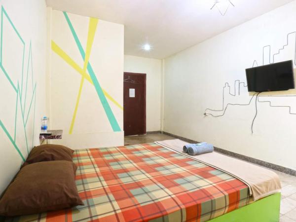 Wisma Gading Indah 1 : photo 9 de la chambre chambre double supérieure