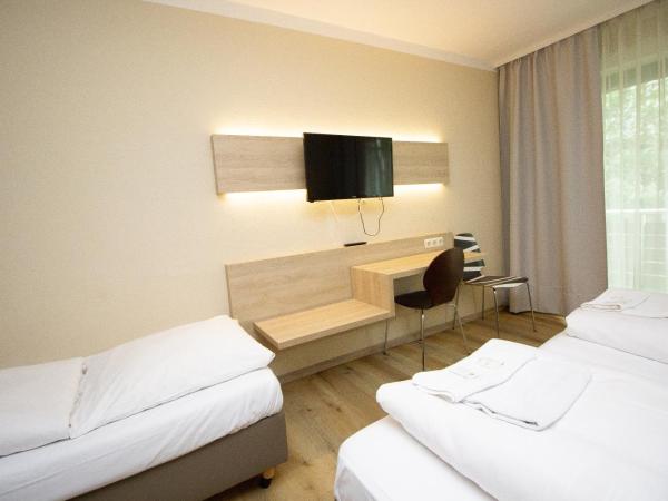 Ahorn Hotel : photo 1 de la chambre chambre quadruple