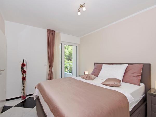 Villa Inis : photo 1 de la chambre suite lit queen-size – vue sur mer