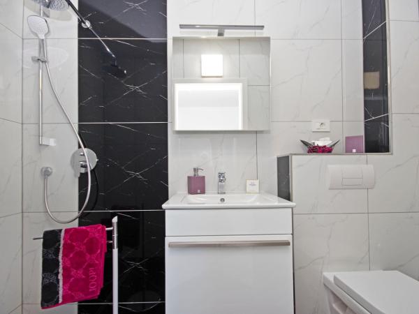 Villa Inis : photo 6 de la chambre suite lit queen-size – vue sur mer