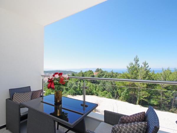 Villa Inis : photo 1 de la chambre suite lit queen-size – vue sur mer