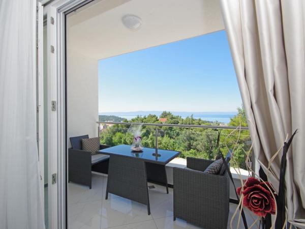 Villa Inis : photo 7 de la chambre suite lit queen-size – vue sur mer