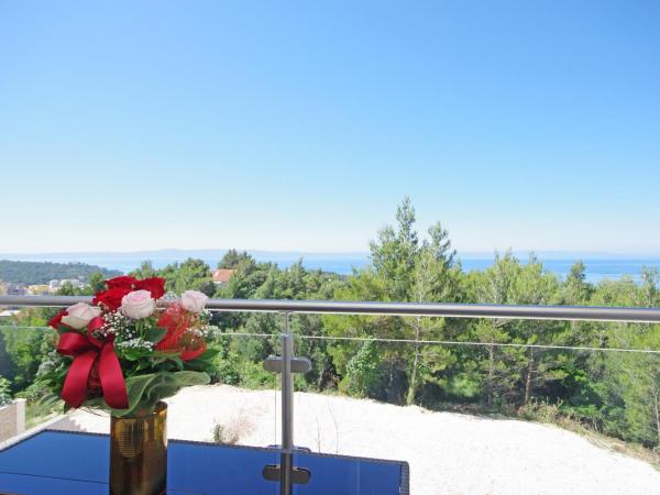 Villa Inis : photo 3 de la chambre suite lit queen-size – vue sur mer