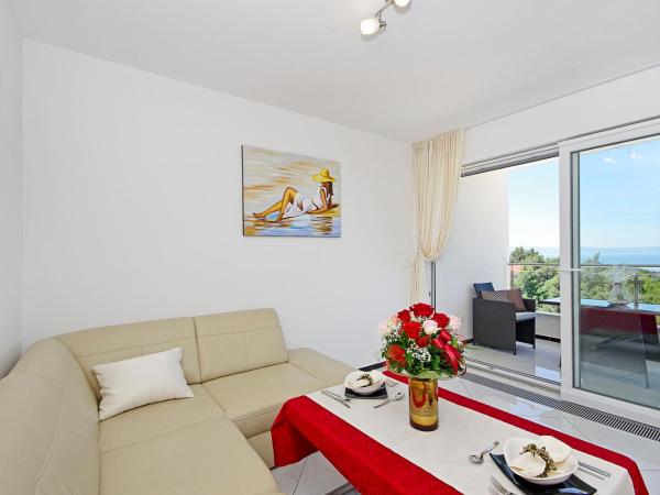 Villa Inis : photo 7 de la chambre suite lit queen-size – vue sur mer