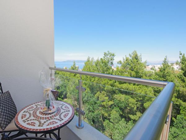 Villa Inis : photo 5 de la chambre suite lit queen-size – vue sur mer