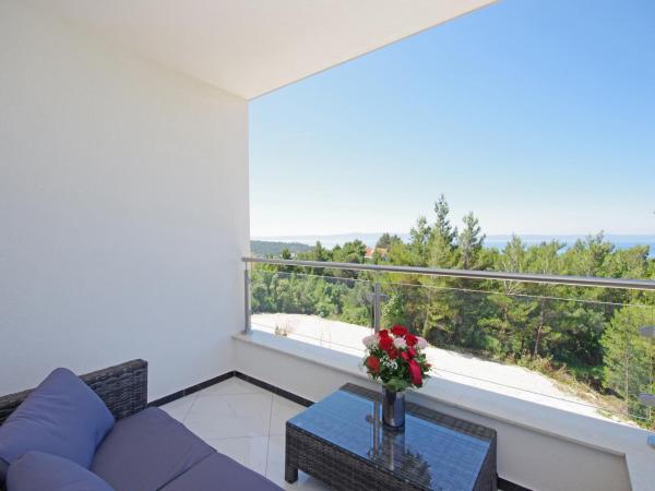 Villa Inis : photo 6 de la chambre suite lit queen-size – vue sur mer