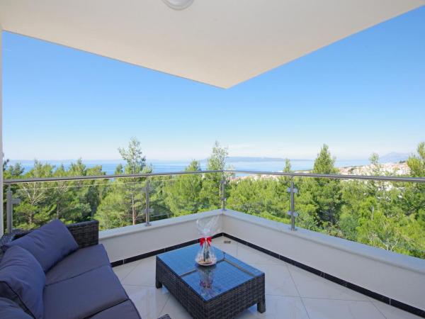 Villa Inis : photo 10 de la chambre suite lit queen-size – vue sur mer